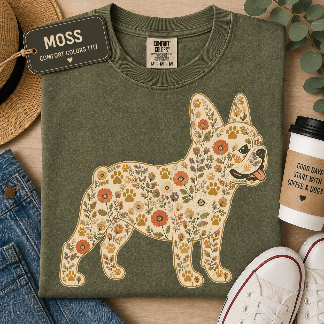 Close-up of the floral French Bulldog graphic on a garment-dyed tee